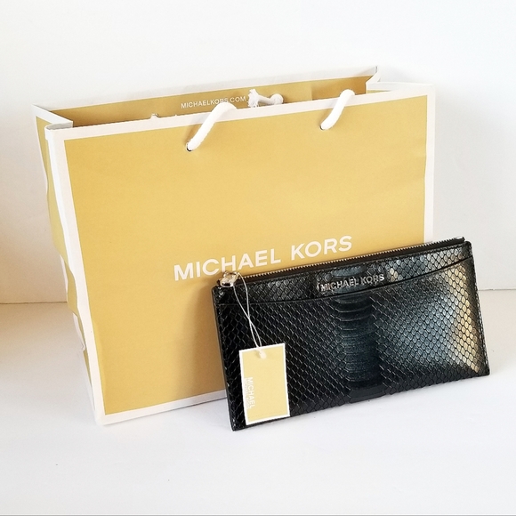 Michael Kors Handbags - Michael kors embossed leather wallet NWT